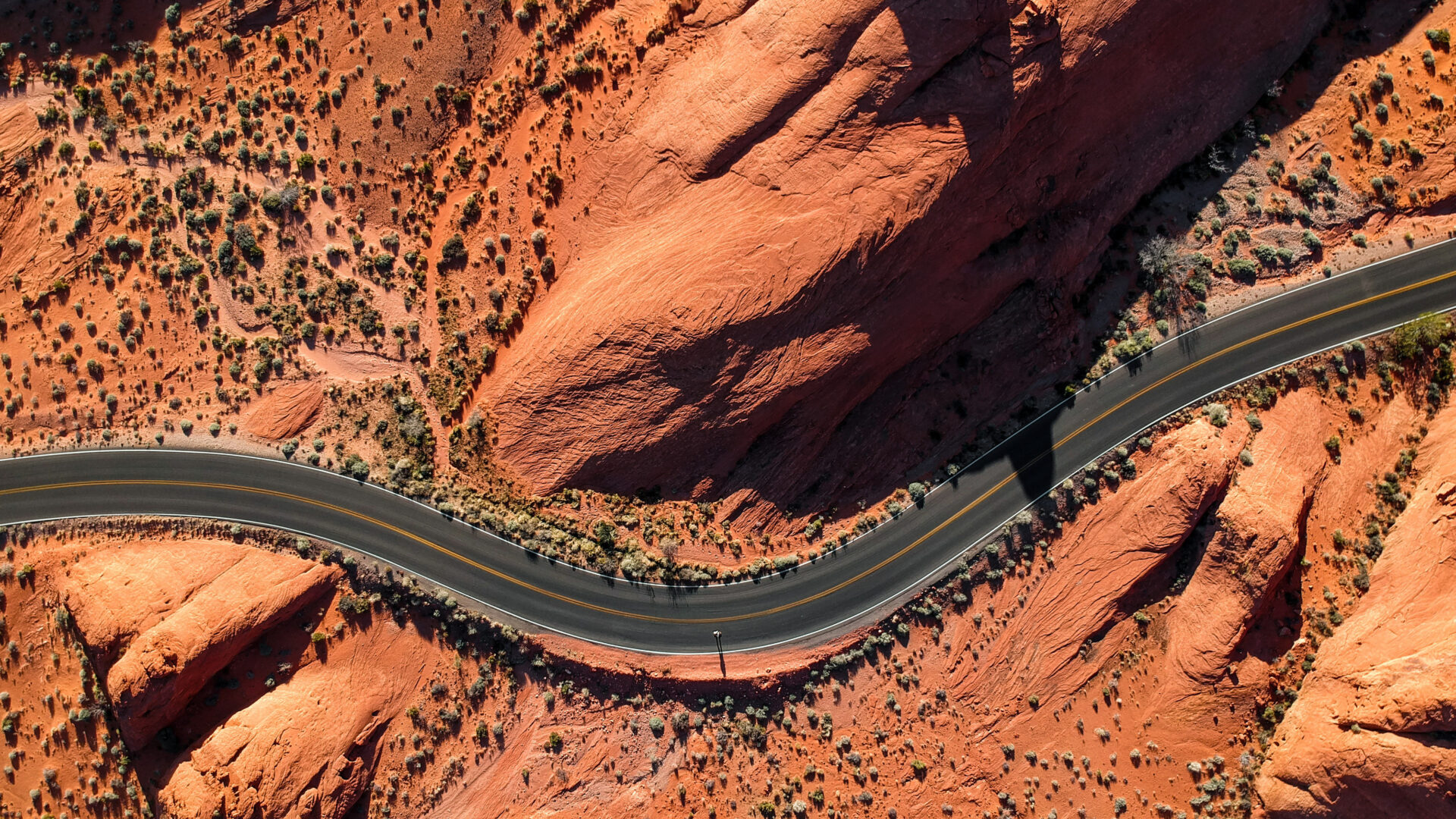 Aerial view of road through desert